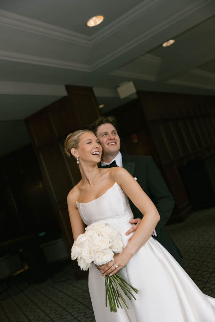 Bride and groom portraits in the art-deco lobby of Hotel Phillips in Kansas City.