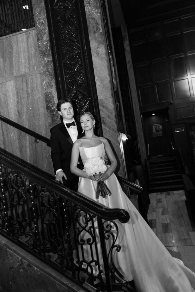 Bride and groom portraits in the art-deco lobby of Hotel Phillips in Kansas City.