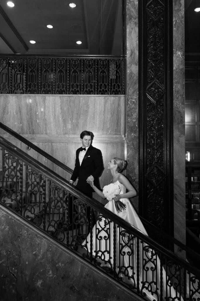 Bride and groom portraits in the art-deco lobby of Hotel Phillips in Kansas City.