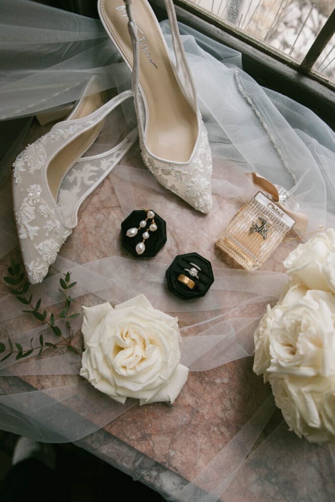 Wedding day details in the art-deco lobby of Hotel Phillips in Kansas City.