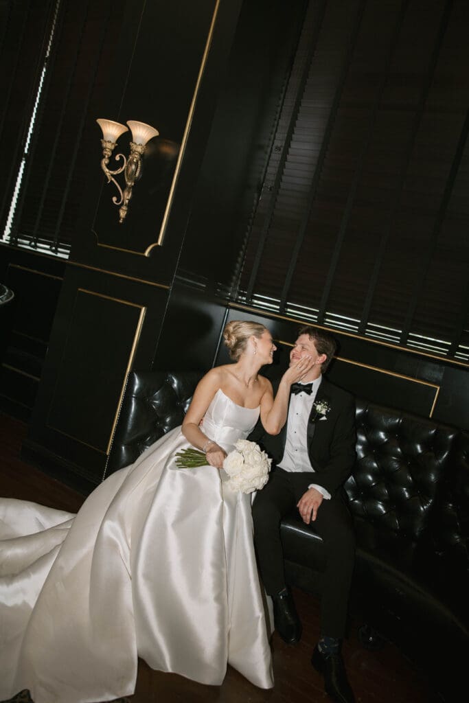 Moody flash bride and groom portraits at Kill Devil Club at Power and Light