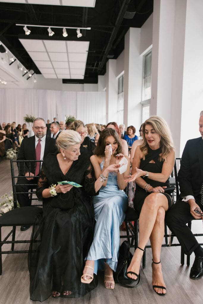 Guests having heartfelt reactions during Kansas City wedding ceremony
