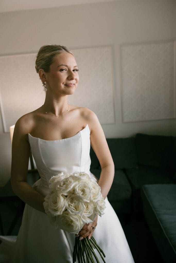 Bride and groom portraits in the art-deco lobby of Hotel Phillips in Kansas City.