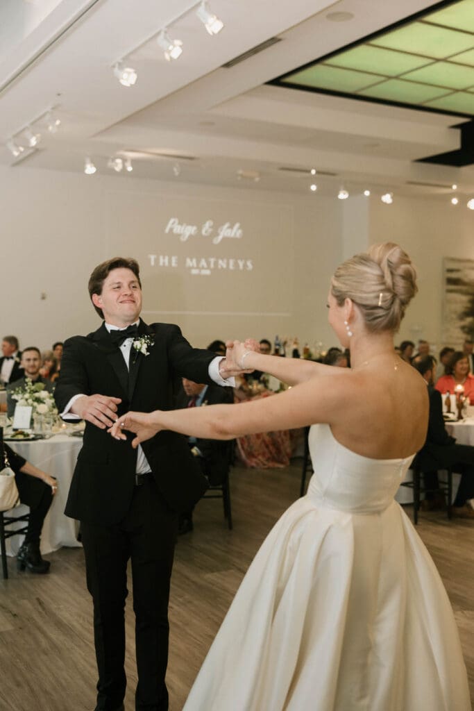 bride and groom wedding day first dance at gallery event space in kansas city