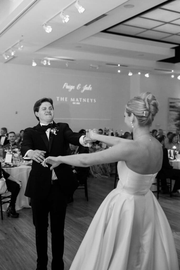 bride and groom wedding day first dance at gallery event space in kansas city