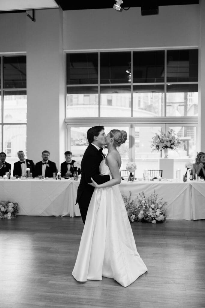 bride and groom wedding day first dance at gallery event space in kansas city
