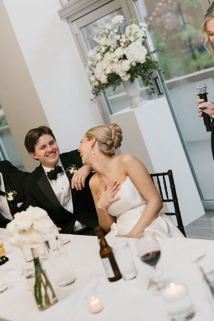 bride and groom wedding day speeches at gallery event space in kansas city