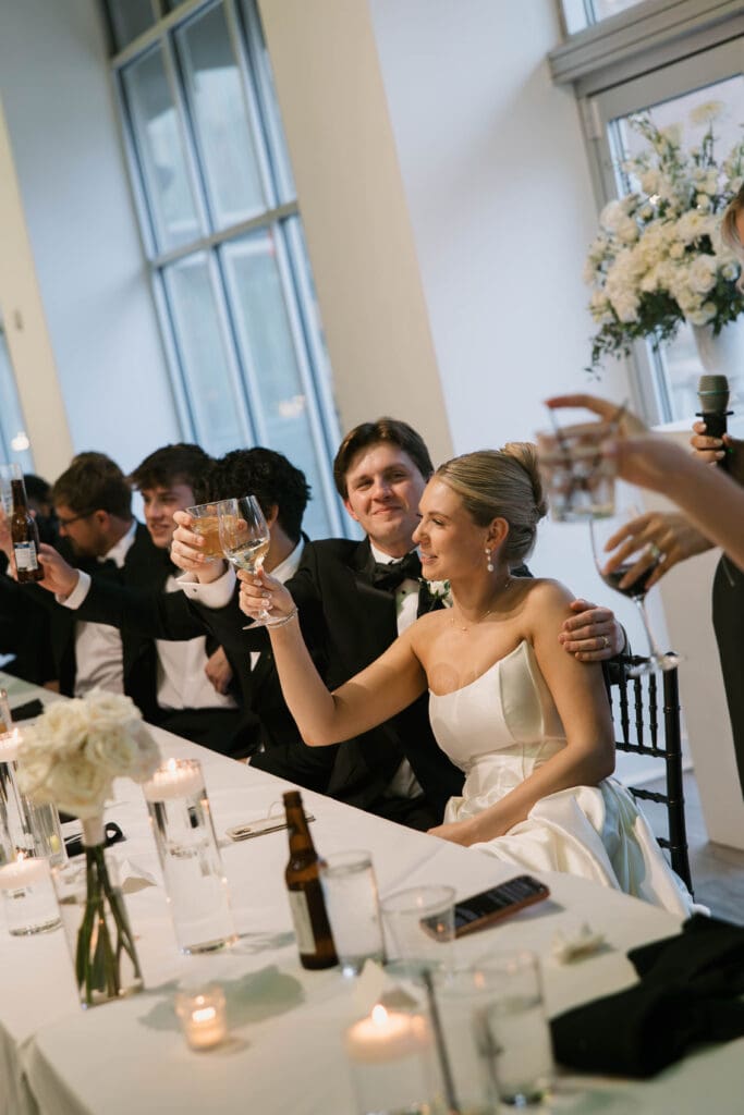 bride and groom wedding day speeches at gallery event space in kansas city