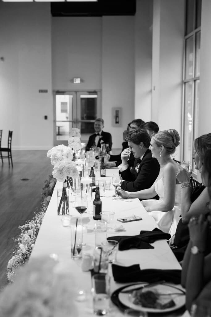 bride and groom wedding day speeches at gallery event space in kansas city