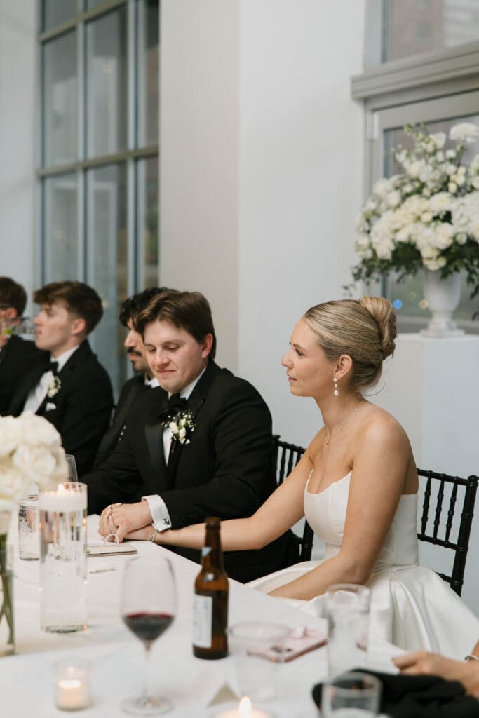 bride and groom wedding day speeches at gallery event space in kansas city